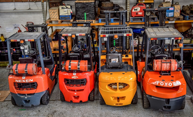 row of forklift trucks